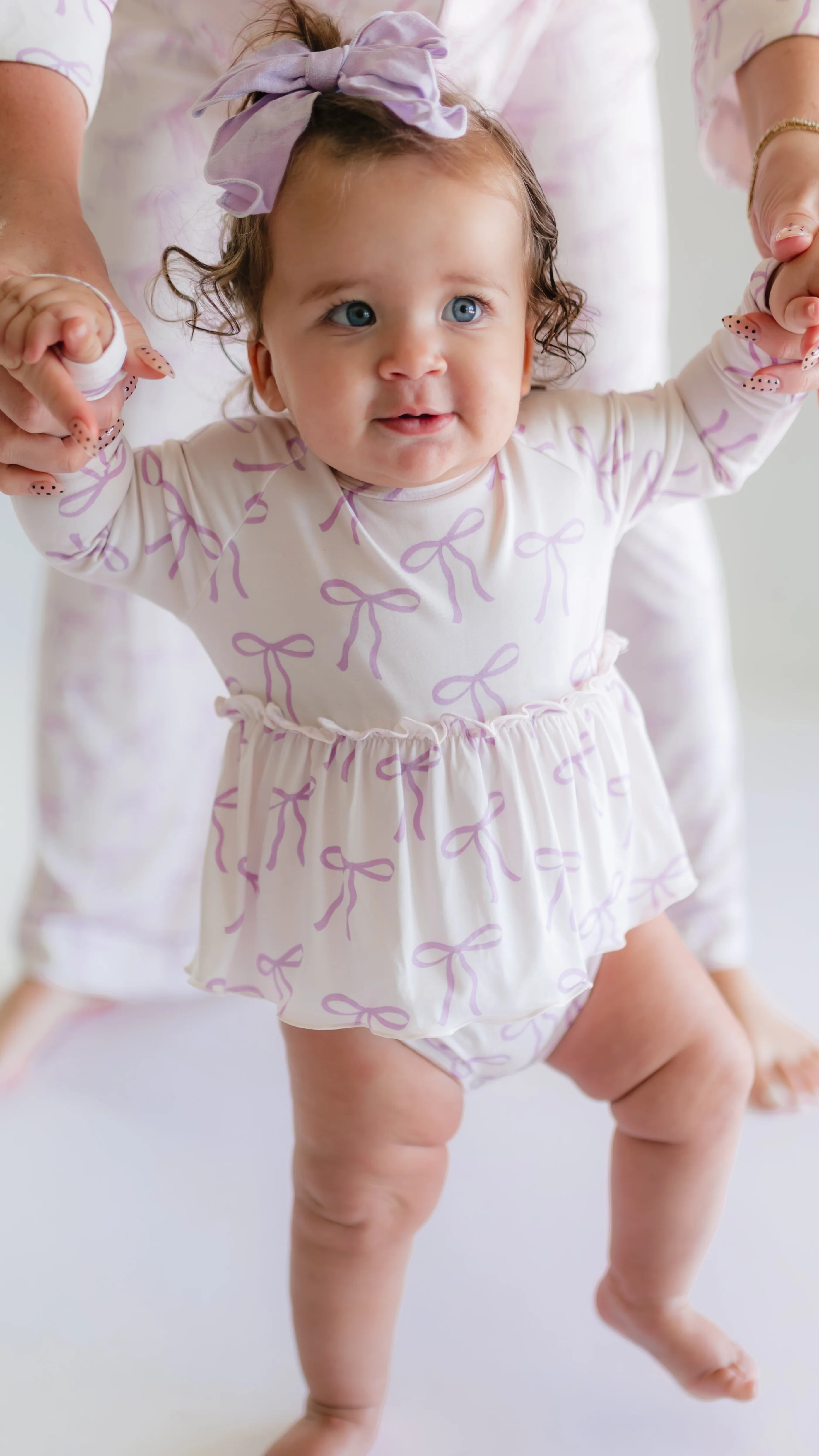 Infant Long Sleeve and Skirt Onesie in Purple Bows
