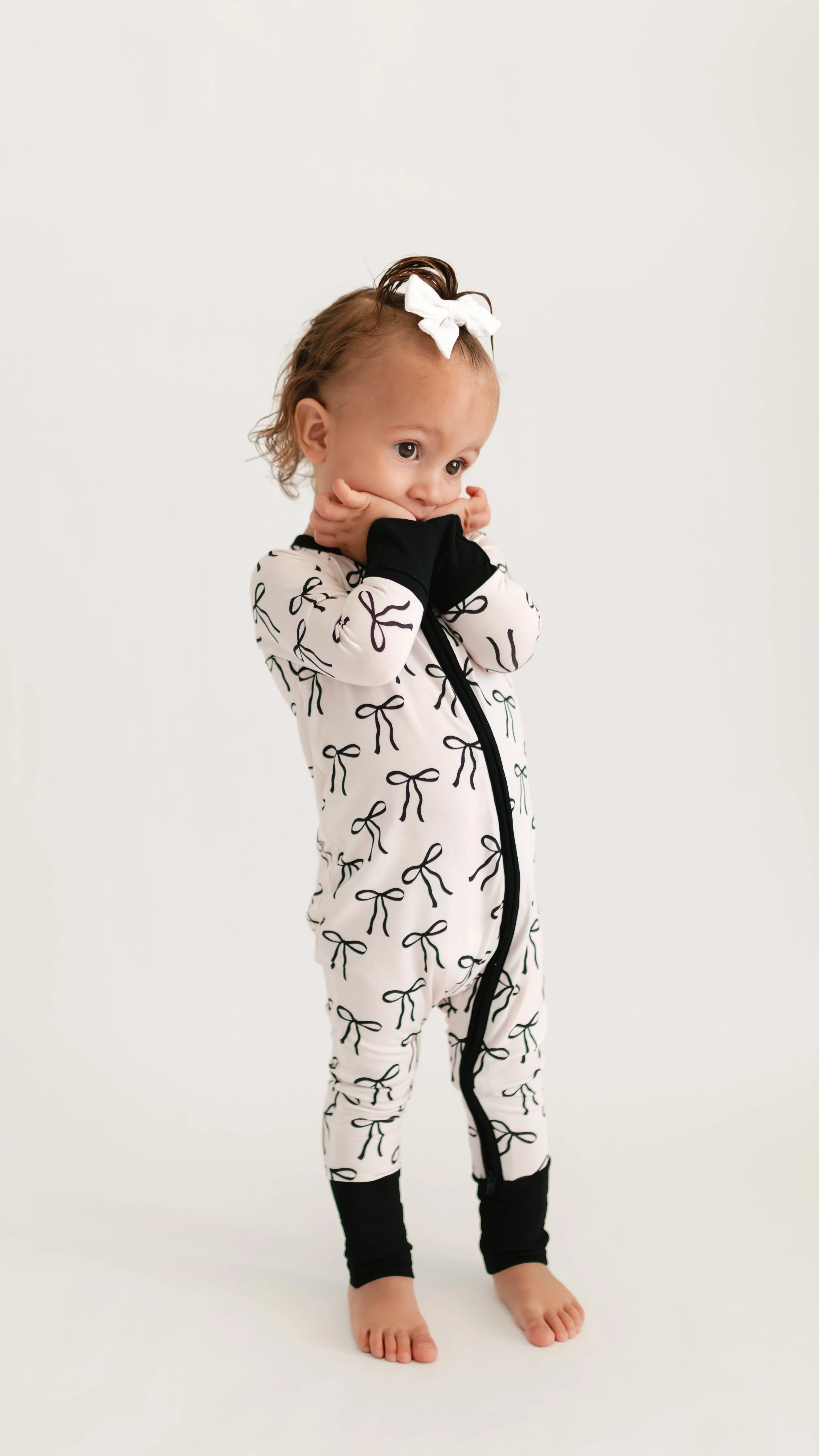 Infant Romper in Black Bows - Image 3