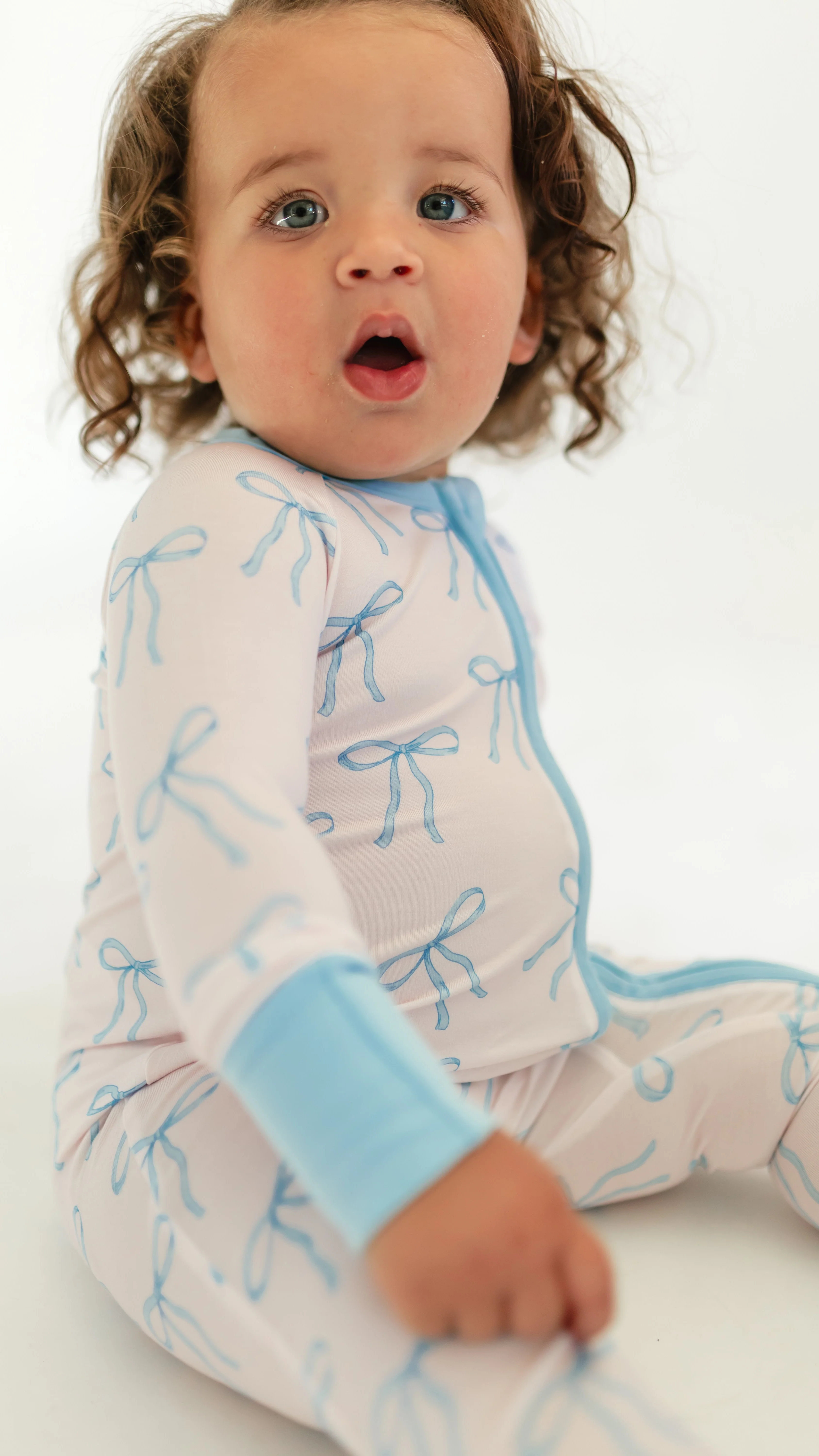 Infant Romper in Blue Bows