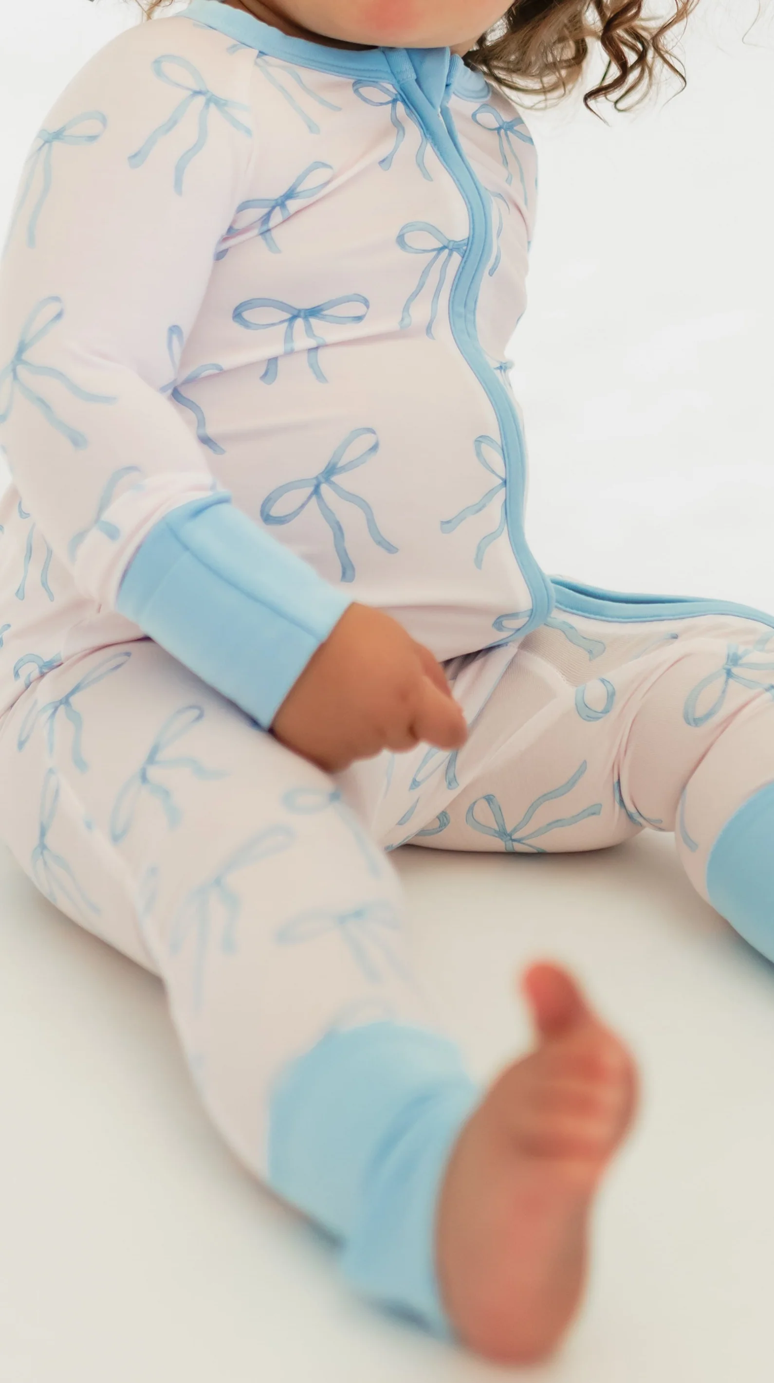 Infant Romper in Blue Bows - Image 2